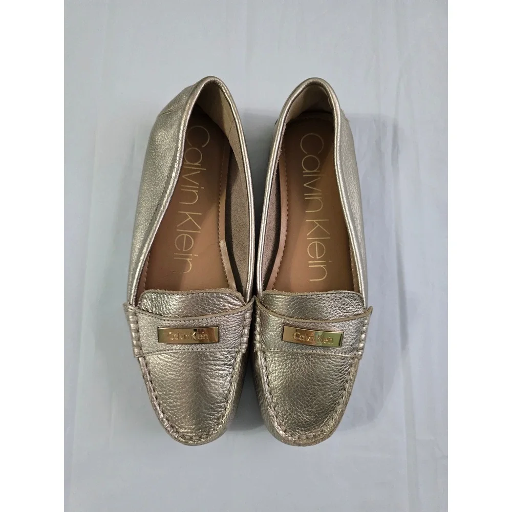 Calvin Klein Leta Metallic Gold Leather Loafers Driving Mocs Logo Hardware 8.5